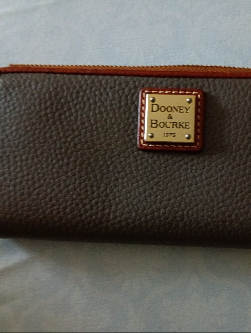 Dooney & Bourke Dark Brown Pebbled Leather Zip Wallet with Tan Trim